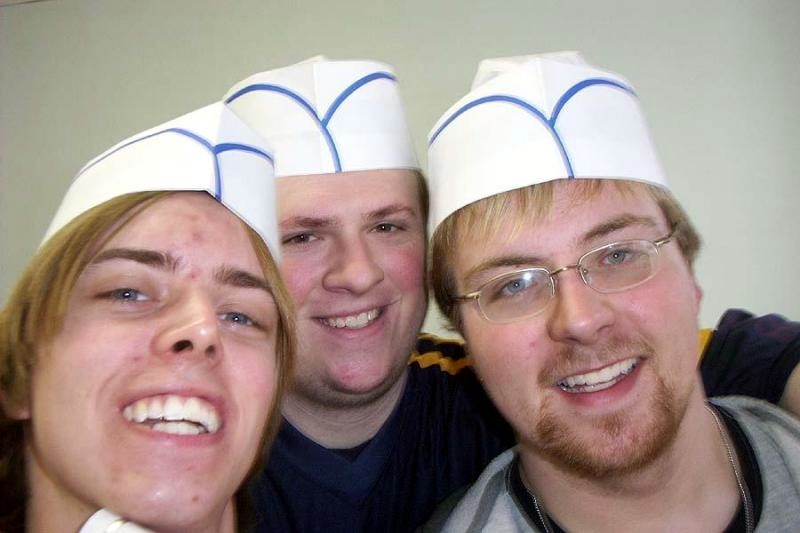 Dan Hale, Andrew Stahl, and I goofing around with some hats that we found!  I'm in the middle.